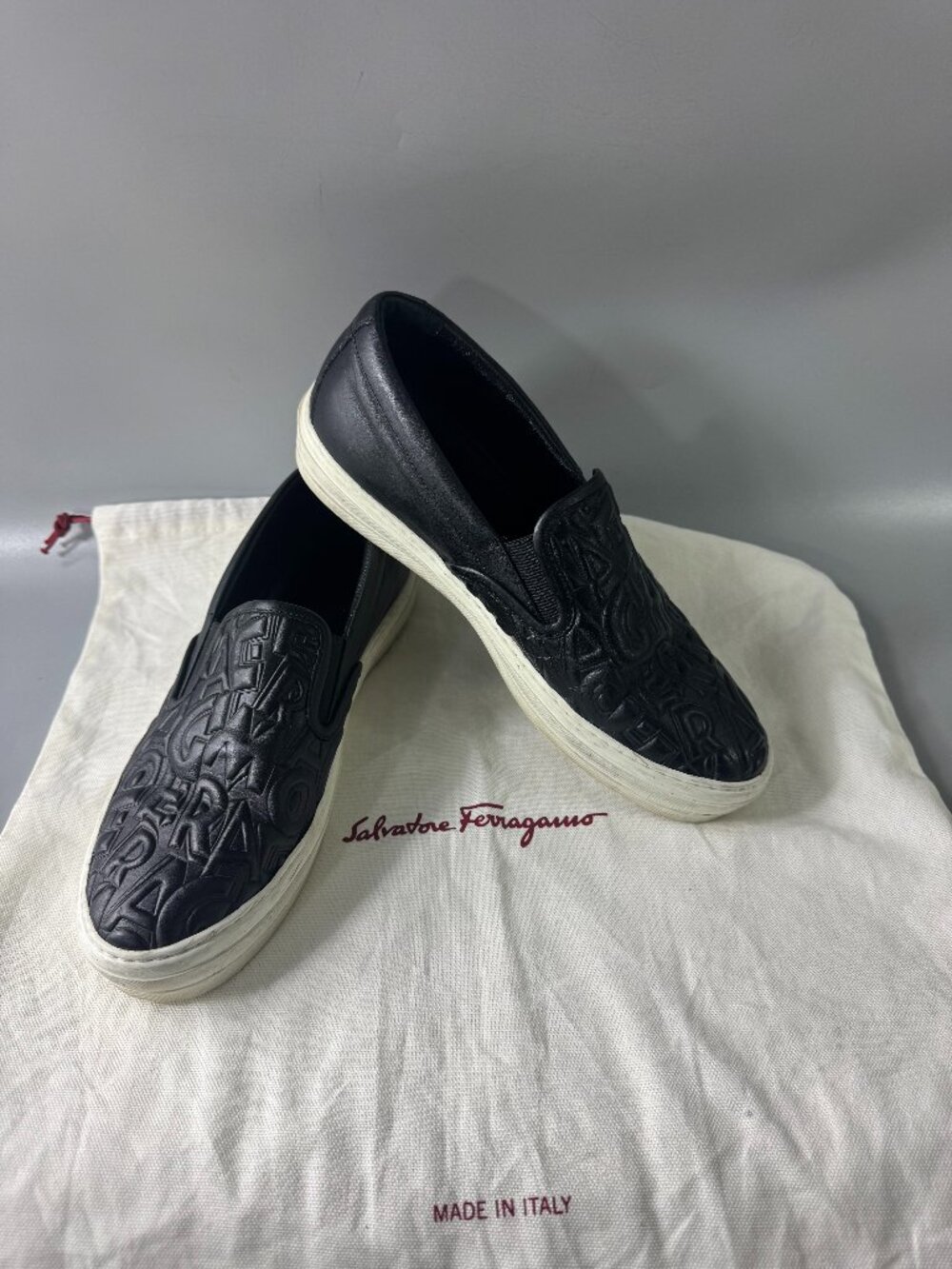 Salvatore Ferragamo Black Embossed Leather Slip-On Sneakers with White Soles